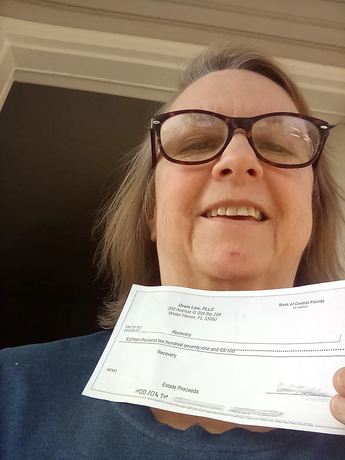 Joanna holding documents